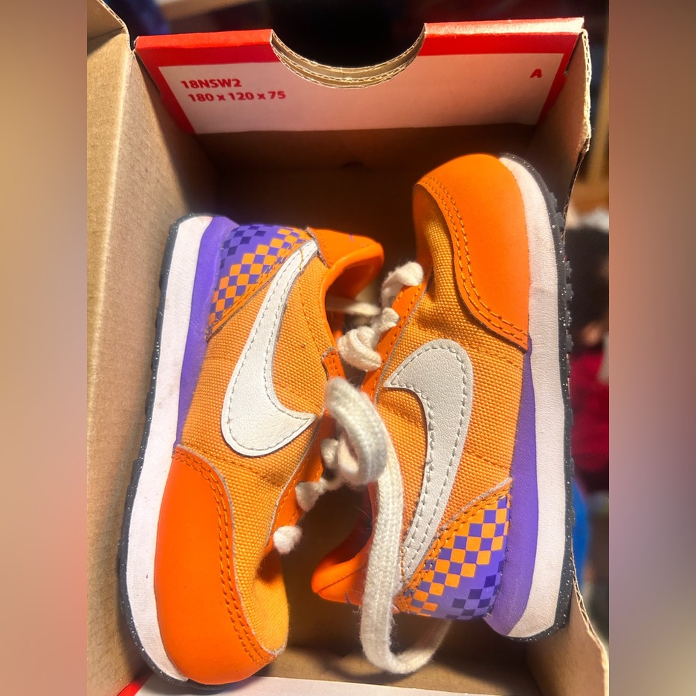 Baby Nike waffle trainers.